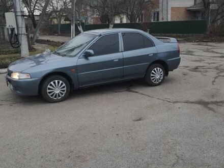 Синий Мицубиси Лансер, объемом двигателя 0 л и пробегом 270 тыс. км за 1700 $, фото 1 на Automoto.ua