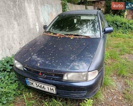 Синий Мицубиси Лансер, объемом двигателя 1.3 л и пробегом 371 тыс. км за 1200 $, фото 1 на Automoto.ua