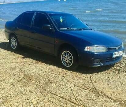 Синій Міцубісі Lancer, об'ємом двигуна 1.3 л та пробігом 400 тис. км за 1800 $, фото 1 на Automoto.ua