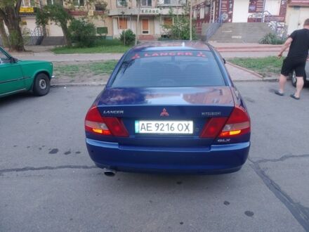 Синій Міцубісі Lancer, об'ємом двигуна 1.3 л та пробігом 270 тис. км за 2100 $, фото 1 на Automoto.ua