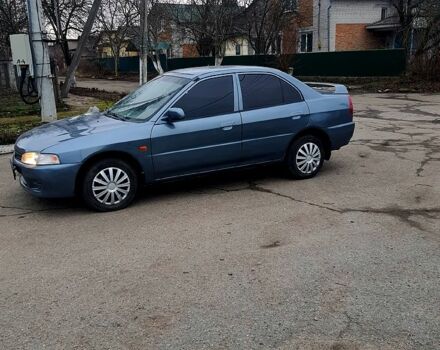 Синій Міцубісі Lancer, об'ємом двигуна 1.8 л та пробігом 180 тис. км за 1700 $, фото 1 на Automoto.ua