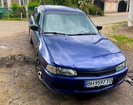 Синий Мицубиси Лансер, объемом двигателя 1.3 л и пробегом 300 тыс. км за 2300 $, фото 1 на Automoto.ua