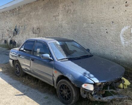 Синій Міцубісі Lancer, об'ємом двигуна 1.6 л та пробігом 200 тис. км за 450 $, фото 1 на Automoto.ua