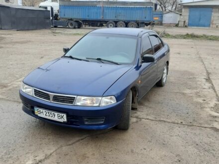 Синий Мицубиси Лансер, объемом двигателя 0 л и пробегом 240 тыс. км за 2300 $, фото 1 на Automoto.ua