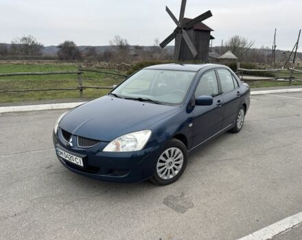 Синій Міцубісі Lancer, об'ємом двигуна 1.6 л та пробігом 182 тис. км за 3500 $, фото 1 на Automoto.ua