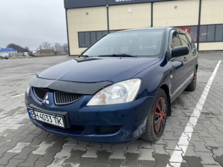 Міцубісі Lancer 2003 у Вінниці на Automoto.ua Синій Міцубісі Lancer, об'ємом двигуна 1.6 л та пробігом 240 тис. км за 2600 $, фото 1 на Automoto.ua