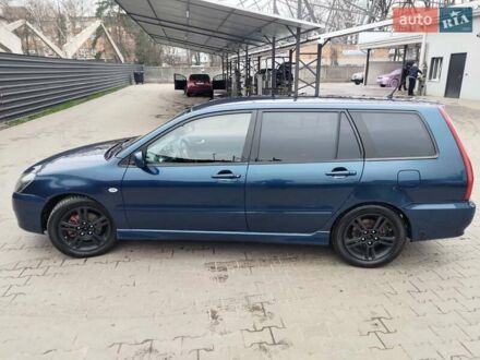 Міцубісі Lancer 2003 у Сумах на Automoto.ua Синій Міцубісі Lancer, об'ємом двигуна 2 л та пробігом 330 тис. км за 3700 $, фото 1 на Automoto.ua