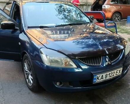 Синий Мицубиси Лансер, объемом двигателя 1.58 л и пробегом 411 тыс. км за 2800 $, фото 1 на Automoto.ua