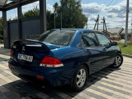 Мицубиси Лансер 2003 в Львове на Automoto.ua Синий Мицубиси Лансер, объемом двигателя 1.6 л и пробегом 400 тыс. км за 2500 $, фото 1 на Automoto.ua