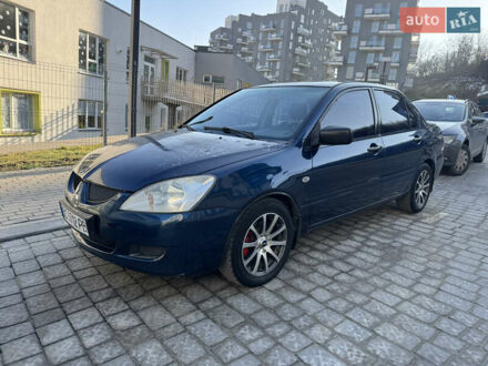 Синій Міцубісі Lancer, об'ємом двигуна 1.6 л та пробігом 400 тис. км за 2600 $, фото 1 на Automoto.ua