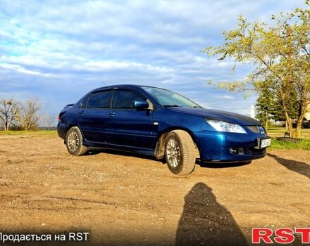 Синій Міцубісі Lancer, об'ємом двигуна 1.6 л та пробігом 190 тис. км за 4000 $, фото 1 на Automoto.ua