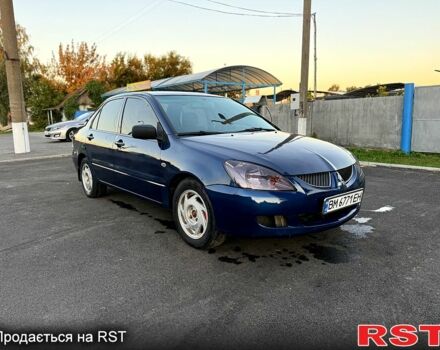 Синій Міцубісі Lancer, об'ємом двигуна 1.6 л та пробігом 150 тис. км за 3250 $, фото 1 на Automoto.ua