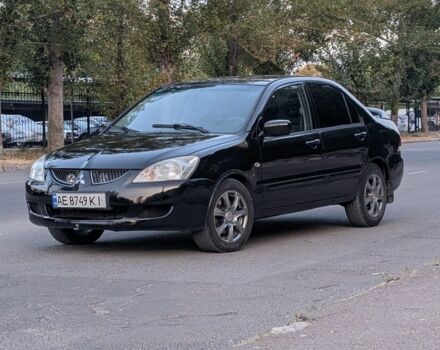 Синій Міцубісі Lancer, об'ємом двигуна 1.6 л та пробігом 188 тис. км за 2899 $, фото 1 на Automoto.ua