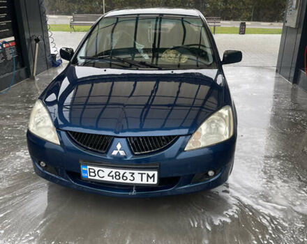 Синій Міцубісі Lancer, об'ємом двигуна 1.58 л та пробігом 234 тис. км за 3500 $, фото 1 на Automoto.ua