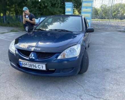 Синий Мицубиси Лансер, объемом двигателя 1.6 л и пробегом 555 тыс. км за 2356 $, фото 1 на Automoto.ua