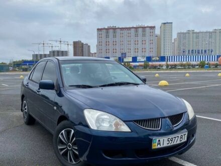 Міцубісі Lancer 2004 у Києві на Automoto.ua Синій Міцубісі Lancer, об'ємом двигуна 1.6 л та пробігом 400 тис. км за 3500 $, фото 1 на Automoto.ua
