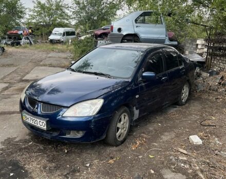 Синій Міцубісі Lancer, об'ємом двигуна 1.6 л та пробігом 200 тис. км за 1199 $, фото 1 на Automoto.ua