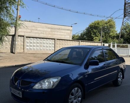Синій Міцубісі Lancer, об'ємом двигуна 1.3 л та пробігом 198 тис. км за 3750 $, фото 1 на Automoto.ua
