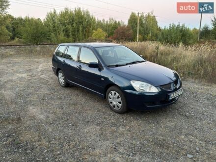 Синій Міцубісі Lancer, об'ємом двигуна 1.58 л та пробігом 199 тис. км за 3999 $, фото 1 на Automoto.ua