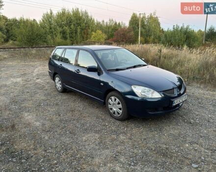 Синій Міцубісі Lancer, об'ємом двигуна 1.58 л та пробігом 199 тис. км за 3999 $, фото 1 на Automoto.ua