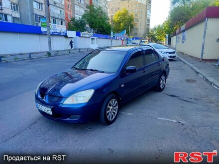 Синій Міцубісі Lancer, об'ємом двигуна 1.6 л та пробігом 257 тис. км за 3750 $, фото 1 на Automoto.ua