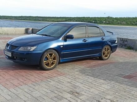 Міцубісі Lancer 2004 у Запоріжжя на Automoto.ua Синій Міцубісі Lancer, об'ємом двигуна 2 л та пробігом 337 тис. км за 4700 $, фото 1 на Automoto.ua