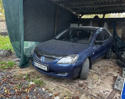 Синій Міцубісі Lancer, об'ємом двигуна 1.6 л та пробігом 325 тис. км за 2399 $, фото 1 на Automoto.ua