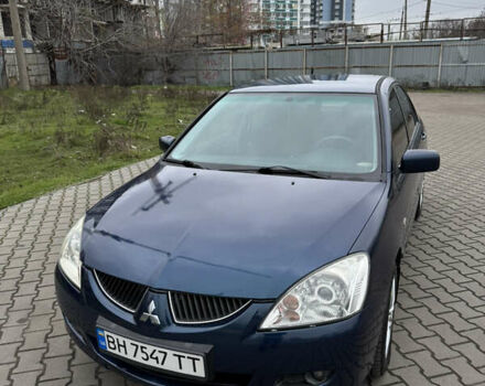 Синій Міцубісі Lancer, об'ємом двигуна 1.6 л та пробігом 200 тис. км за 5000 $, фото 1 на Automoto.ua