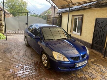 Мицубиси Лансер 2004 в Кривом Роге на Automoto.ua Синий Мицубиси Лансер, объемом двигателя 1.3 л и пробегом 2 тыс. км за 3700 $, фото 1 на Automoto.ua