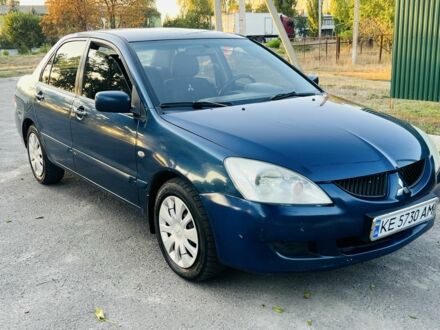 Синій Міцубісі Lancer, об'ємом двигуна 1.6 л та пробігом 260 тис. км за 2850 $, фото 1 на Automoto.ua