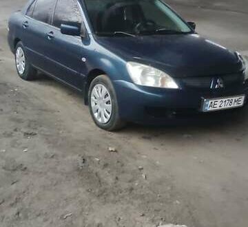 Синий Мицубиси Лансер, объемом двигателя 1.58 л и пробегом 358 тыс. км за 3500 $, фото 1 на Automoto.ua