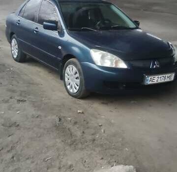 Синій Міцубісі Lancer, об'ємом двигуна 1.58 л та пробігом 358 тис. км за 3500 $, фото 1 на Automoto.ua