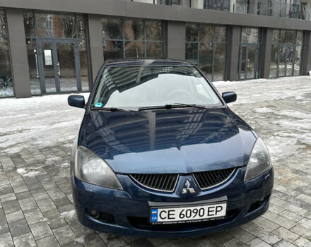 Синий Мицубиси Лансер, объемом двигателя 1.58 л и пробегом 293 тыс. км за 4299 $, фото 1 на Automoto.ua