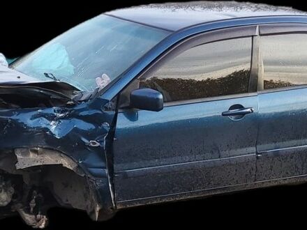 Синий Мицубиси Лансер, объемом двигателя 1 л и пробегом 380 тыс. км за 1421 $, фото 1 на Automoto.ua