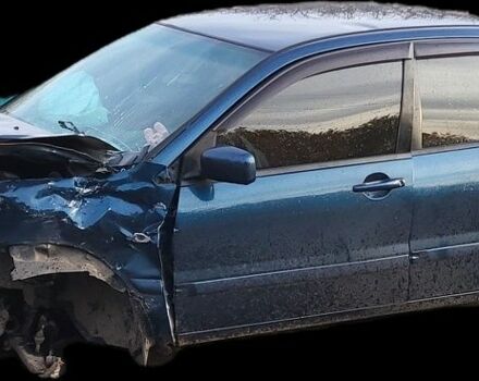 Синий Мицубиси Лансер, объемом двигателя 1 л и пробегом 380 тыс. км за 1421 $, фото 1 на Automoto.ua