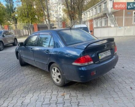 Синій Міцубісі Lancer, об'ємом двигуна 2 л та пробігом 237 тис. км за 3499 $, фото 1 на Automoto.ua