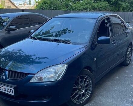 Синій Міцубісі Lancer, об'ємом двигуна 2 л та пробігом 335 тис. км за 4700 $, фото 1 на Automoto.ua