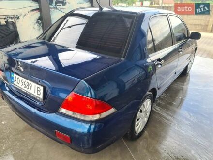 Міцубісі Lancer 2005 у Мукачеве на Automoto.ua Синій Міцубісі Lancer, об'ємом двигуна 1.58 л та пробігом 330 тис. км за 3600 $, фото 1 на Automoto.ua