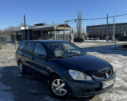 Синий Мицубиси Лансер, объемом двигателя 1.6 л и пробегом 221 тыс. км за 3600 $, фото 1 на Automoto.ua