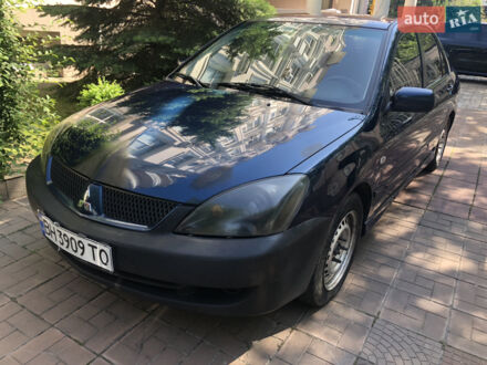 Синій Міцубісі Lancer, об'ємом двигуна 1.6 л та пробігом 235 тис. км за 3500 $, фото 1 на Automoto.ua