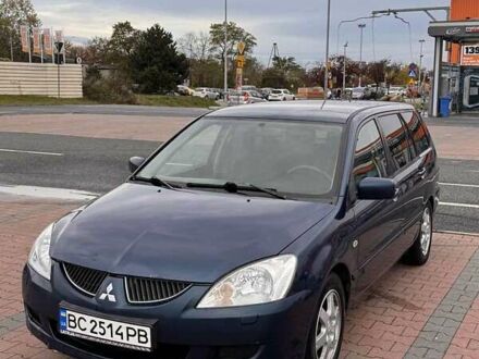 Синій Міцубісі Lancer, об'ємом двигуна 1.58 л та пробігом 220 тис. км за 2699 $, фото 1 на Automoto.ua