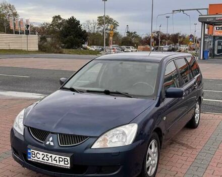 Синий Мицубиси Лансер, объемом двигателя 1.58 л и пробегом 220 тыс. км за 2699 $, фото 1 на Automoto.ua
