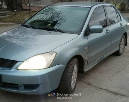 Синий Мицубиси Лансер, объемом двигателя 1.6 л и пробегом 277 тыс. км за 3400 $, фото 1 на Automoto.ua