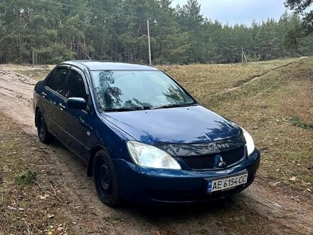 Синій Міцубісі Lancer, об'ємом двигуна 1.6 л та пробігом 210 тис. км за 3150 $, фото 1 на Automoto.ua