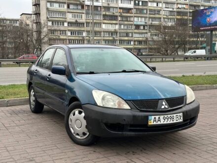 Синій Міцубісі Lancer, об'ємом двигуна 1.6 л та пробігом 260 тис. км за 2300 $, фото 1 на Automoto.ua