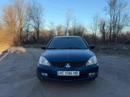 Синий Мицубиси Лансер, объемом двигателя 1.6 л и пробегом 330 тыс. км за 3999 $, фото 1 на Automoto.ua