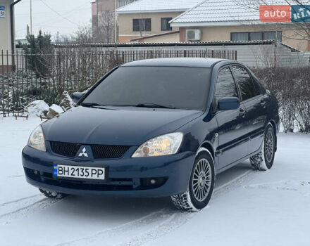Синий Мицубиси Лансер, объемом двигателя 1.58 л и пробегом 293 тыс. км за 4799 $, фото 1 на Automoto.ua