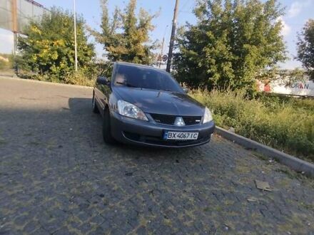 Міцубісі Lancer 2006 у Хмельницькому на Automoto.ua Синій Міцубісі Lancer, об'ємом двигуна 1.6 л та пробігом 290 тис. км за 4100 $, фото 1 на Automoto.ua