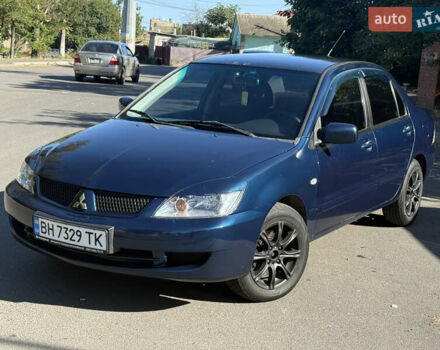 Синій Міцубісі Lancer, об'ємом двигуна 1.58 л та пробігом 208 тис. км за 4200 $, фото 1 на Automoto.ua