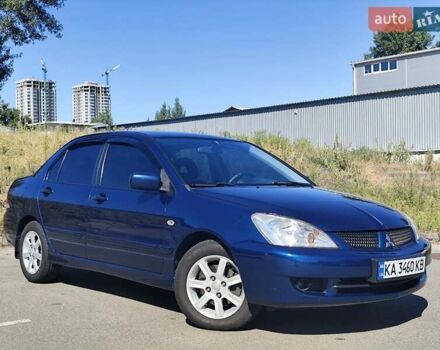 Синій Міцубісі Lancer, об'ємом двигуна 1.58 л та пробігом 233 тис. км за 4499 $, фото 1 на Automoto.ua